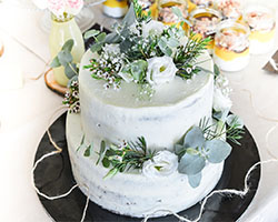 Light green wedding cake with  white green florals